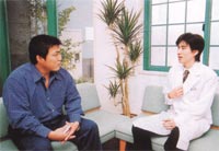 古賀稔彦さんと院長